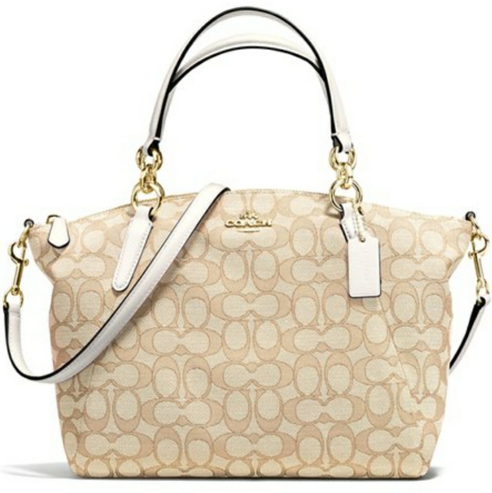 COACH signature canvas Kelsey mini crossbody purse.